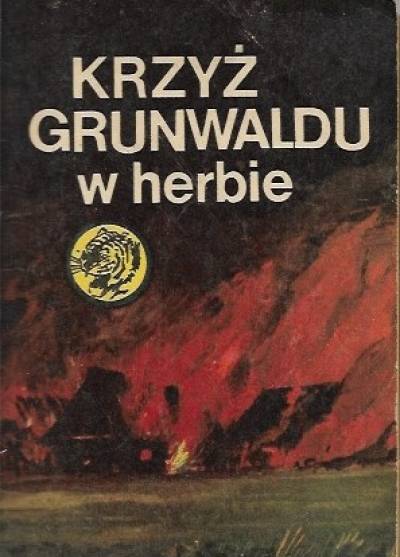 Krzysztof Wójtowicz - Krzyż Grunwaldu w herbie (żółty tygrys)